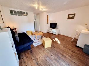 Appartements Grand T2 tout equipe centre ville avec cour : photos des chambres