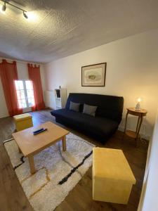 Appartements Grand T2 tout equipe centre ville avec cour : photos des chambres