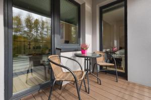 Kołobrzeg Four Season Apartment by Noclegi Renters