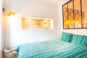 Appartements Sauna - Le loft des remparts - FloBNB : photos des chambres