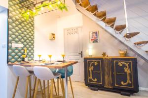 Appartements Sauna - Le loft des remparts - FloBNB : photos des chambres