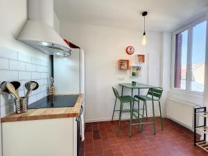 Appartements Studio LE VINTAGE - Maison 1911 - confort & prestige : photos des chambres