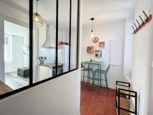 Appartements Studio LE VINTAGE - Maison 1911 - confort & prestige : photos des chambres