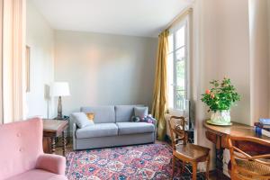 Appartements Le Monarque - Appartement avec jardin : photos des chambres