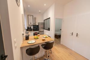 Appartements KASA LOFT CENTRE 2 - WIFI et TV - Confortable et stationnement gratuit a proximite : photos des chambres