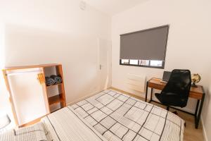 Appartements KASA LOFT CENTRE 2 - WIFI et TV - Confortable et stationnement gratuit a proximite : photos des chambres