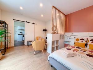 Appartements Le Nid - hebergement cosy : photos des chambres