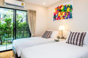 Direct pool access apartment at The Title by Lofty