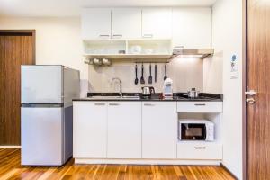 Direct pool access apartment at The Title by Lofty