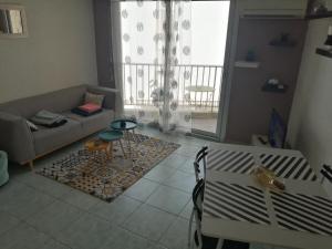 Joli studio bord de mer, clim, balcon, parking privé