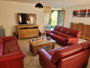 Maisons de vacances La Vieille Grange avec piscine et jardin : photos des chambres