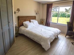 Maisons de vacances Villa in Port Blanc near Scenic Beaches : photos des chambres