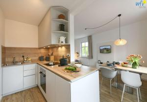 Haus am Dorfbrunnen Ferienwohnung Muschel