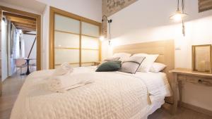 Madera y Piedra - Apartamentos Aloha Toledo