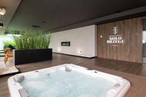 Podczele Seashore SPA & Jacuzzi Apartments with Parking by Noclegi Renters
