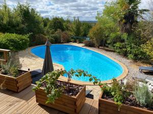 Maisons de vacances Maison de 2 chambres avec piscine privee jardin amenage et wifi a Bruniquel : photos des chambres