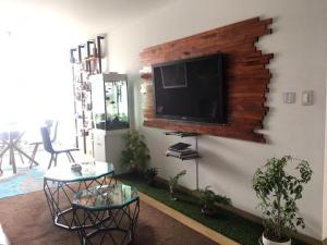 Precioso cuarto dentro de un apartamento centrico compartido