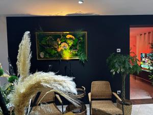 Appartements Pink Tropical Champagne : photos des chambres