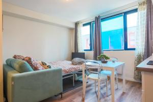 Appartements Studio calme et chaleureux en centre ville : photos des chambres