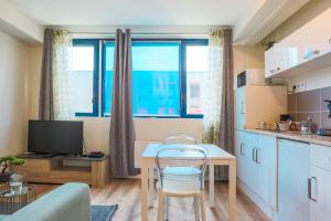 Appartements Studio calme et chaleureux en centre ville : photos des chambres