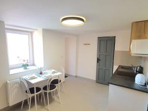 Apartmány ČERNÝ KOHOUT