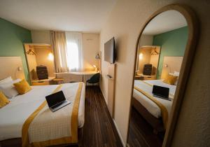 Hotels Kyriad Lyon Est - Bron Eurexpo Le Cottage : photos des chambres