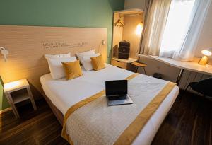 Hotels Kyriad Lyon Est - Bron Eurexpo Le Cottage : photos des chambres