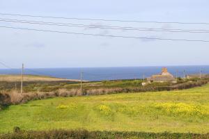 Stunning home, sea views, walk to beach