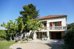 Appartements Appartement avec veranda donnant sur le jardin : photos des chambres