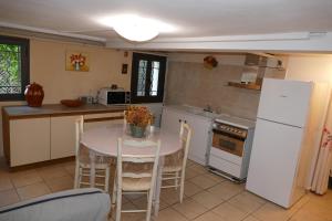 Appartements Appartement avec veranda donnant sur le jardin : photos des chambres