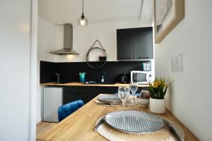 Appartements Le perchoir *hyper centre * A 2 pas de la mer * : photos des chambres