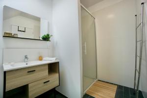 Appartements Le perchoir *hyper centre * A 2 pas de la mer * : photos des chambres