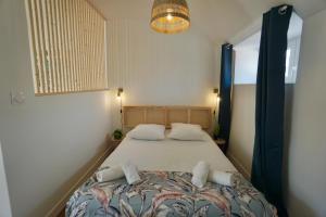 Appartements Le perchoir *hyper centre * A 2 pas de la mer * : photos des chambres