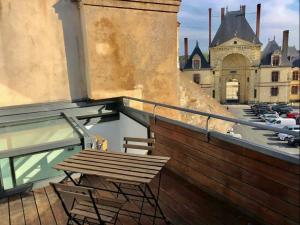 Appartements Suites Rive Gauche - TERRASSE VUE CHATEAU FONTAINEBLEAU - Chez Lydia : photos des chambres