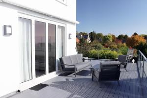 Große Penthouse Ferienwohnung mit Meerblick, Sonnenterrasse & Luxusbad von "Momentic"
