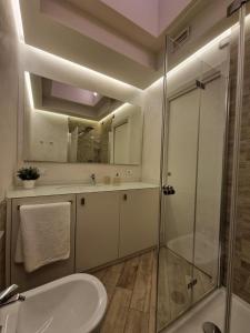 BMP APARTMENT ORCHIDEA piscina, giardino e spiaggia con molo