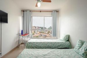 APARTAMENTO, ATÉ 4 PESSOAS,20 Metros da PRAIA do SONHO, PÉ NA AREIA,100 MB WI-FI