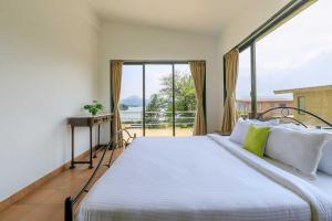 StayVistas Shivom Villa 1 - A Serene Escape with Views of the Valley and Lake