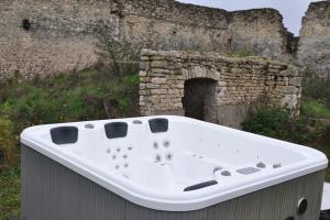 Appartements Maison Chaleureuse avec Jacuzzi : photos des chambres