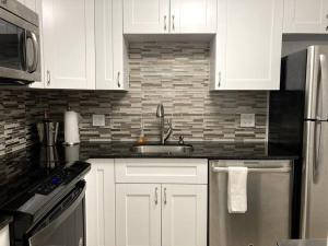 Oceanview on SAND located in Ocean Manor Resort Fort Lauderdale Beach 2 bed 2 bath spacious corner unit partial ocean view