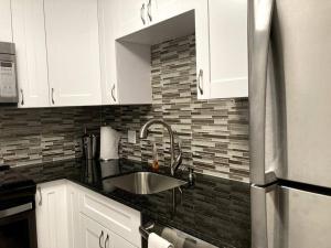 Oceanview on SAND located in Ocean Manor Resort Fort Lauderdale Beach 2 bed 2 bath spacious corner unit partial ocean view