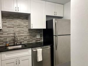 Oceanview on SAND located in Ocean Manor Resort Fort Lauderdale Beach 2 bed 2 bath spacious corner unit partial ocean view