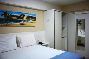 Na praia - Araça 406 Super Luxo - Lateral vista mar