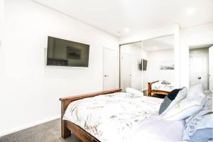 Hurstville温馨舒适公寓。走路1分钟到火车站，周围大型超市，大型商场，电影院，美食街环绕。