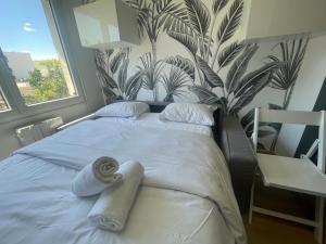 Appartements Rollin 7 YourHostHelper : photos des chambres