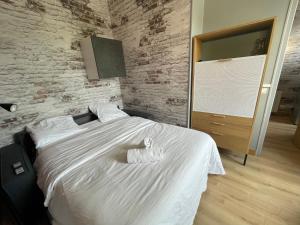 Appartements Rollin 7 YourHostHelper : photos des chambres