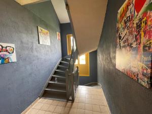 Appartements Rollin 7 YourHostHelper : photos des chambres