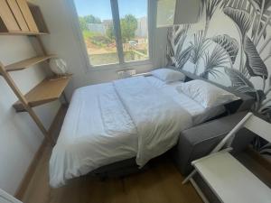 Appartements Rollin 7 YourHostHelper : photos des chambres