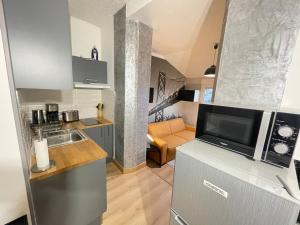 Appartements Rollin 7 YourHostHelper : photos des chambres