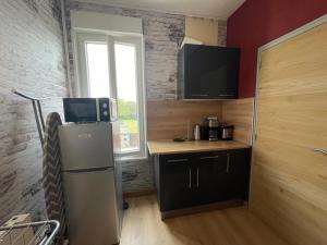 Appartements Rollin 7 YourHostHelper : photos des chambres